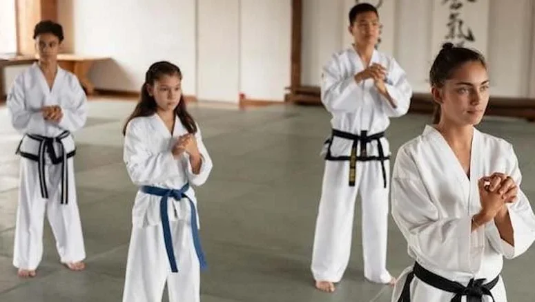 Students of various belt ranks practicing focus and discipline during Karate Classes in Abbotsford at Yogi’s Karate Dojo.