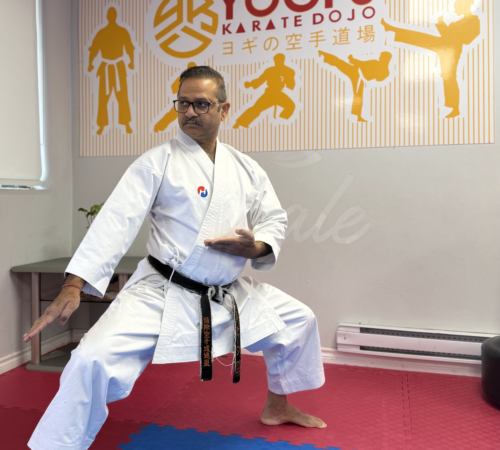 Instructors at Yogi's Karate Dojo, showcasing discipline and teamwork.